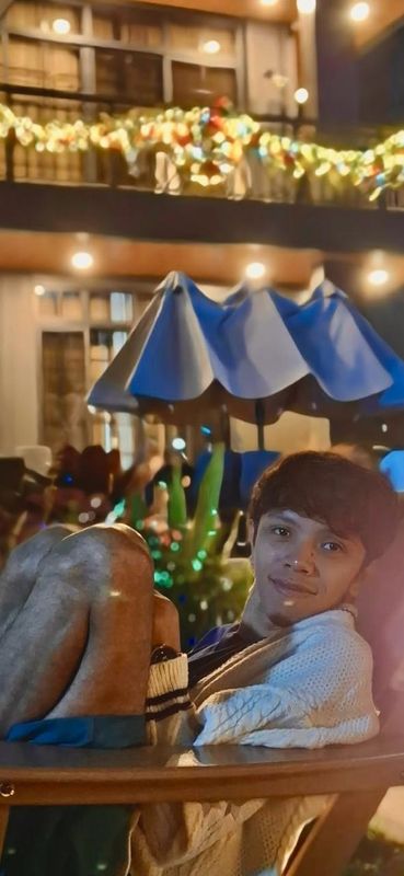 A TrustBridge team member during an evening gathering.